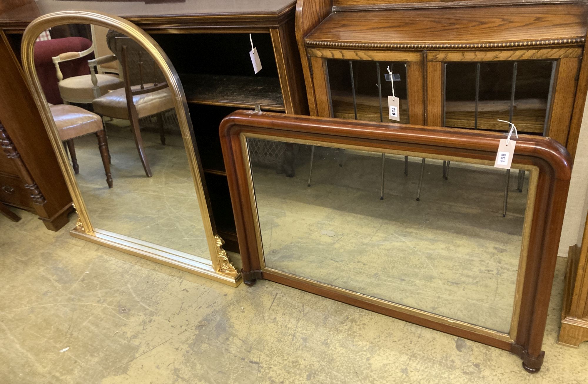 A Victorian mahogany overmantel mirror, width 102cm, height 71cm, together with a reproduction gilt framed overmantel mirror